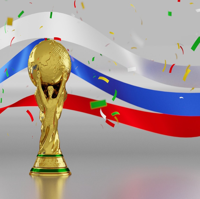 happy winner with phone and confetti